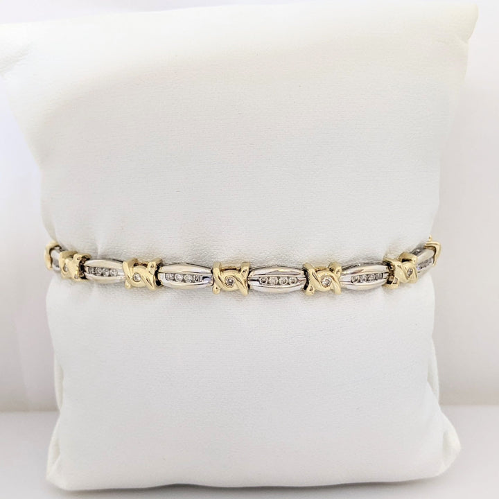 14K TWO-TONE .98 CARAT TOTAL WEIGHT I1 J-K DIAMOND ROUND (60) CHANNEL SET LINK ESTATE BRACELET 12.7 GRAMS
