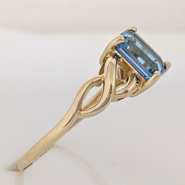 10K BLUE TOPAZ EMERALD CUT 6X8 TWIST TOP ESTATE RING 2.8 GRAMS