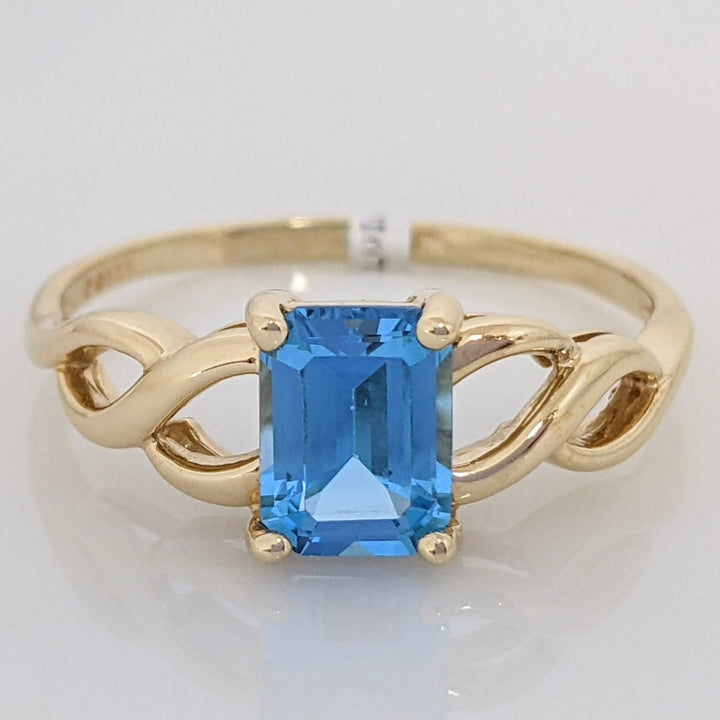 10K BLUE TOPAZ EMERALD CUT 6X8 TWIST TOP ESTATE RING 2.8 GRAMS