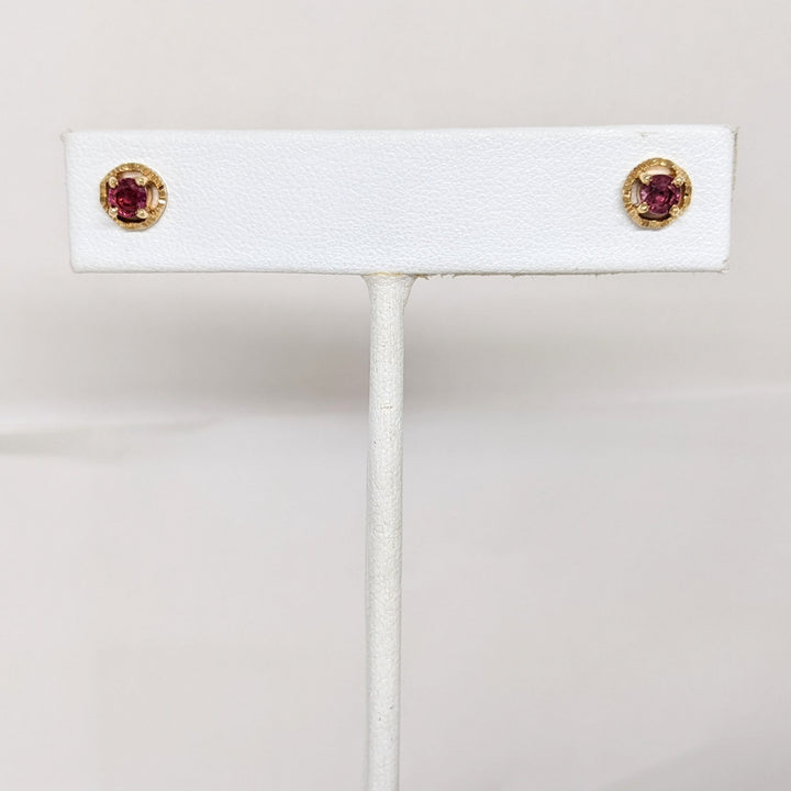 14K RUBY ROUND 3.7MM WITH GOLD TRIM ESTATE EARRINGS 1.7 GRAMS
