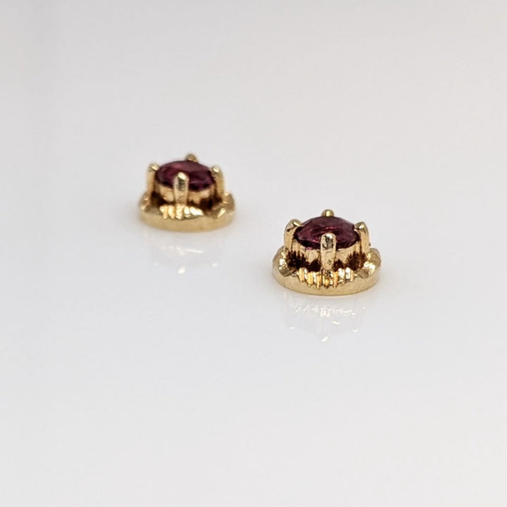 14K RUBY ROUND 3.7MM WITH GOLD TRIM ESTATE EARRINGS 1.7 GRAMS
