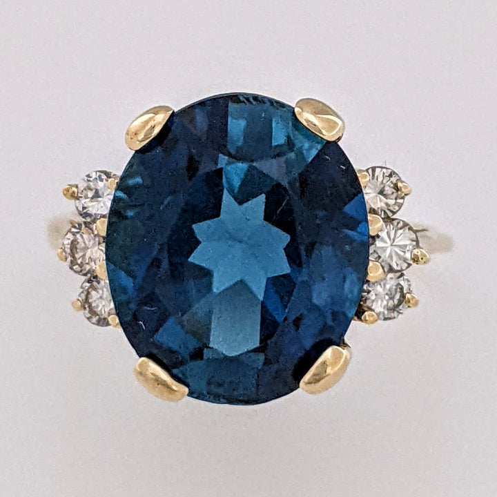 14K LONDON BLUE TOPAZ OVAL 10X12 WITH (6) MELEE ESTATE RING 3.3 GRAMS
