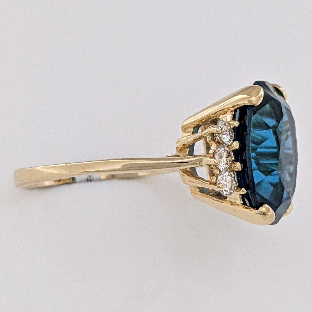 14K LONDON BLUE TOPAZ OVAL 10X12 WITH (6) MELEE ESTATE RING 3.3 GRAMS