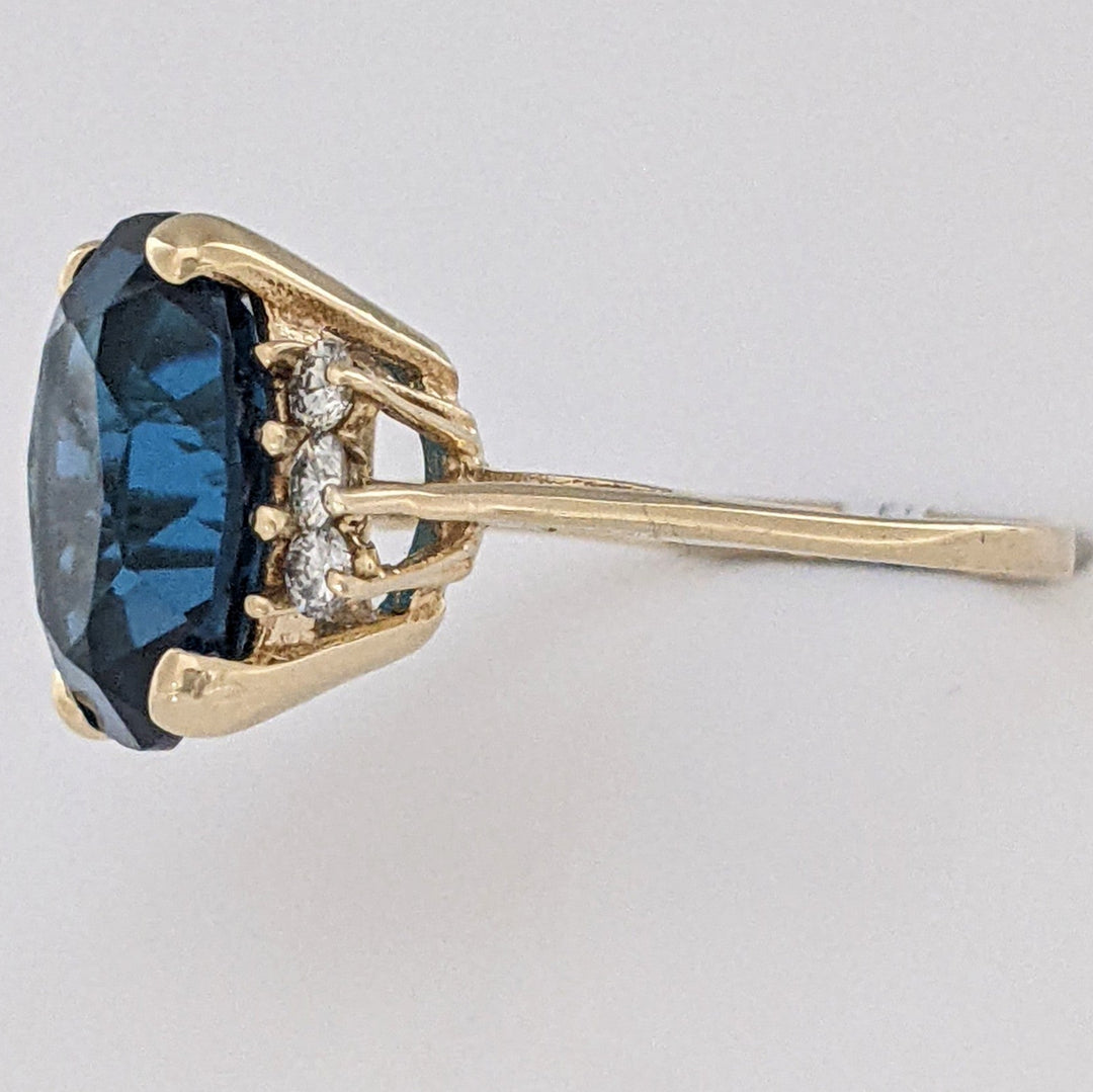 14K LONDON BLUE TOPAZ OVAL 10X12 WITH (6) MELEE ESTATE RING 3.3 GRAMS