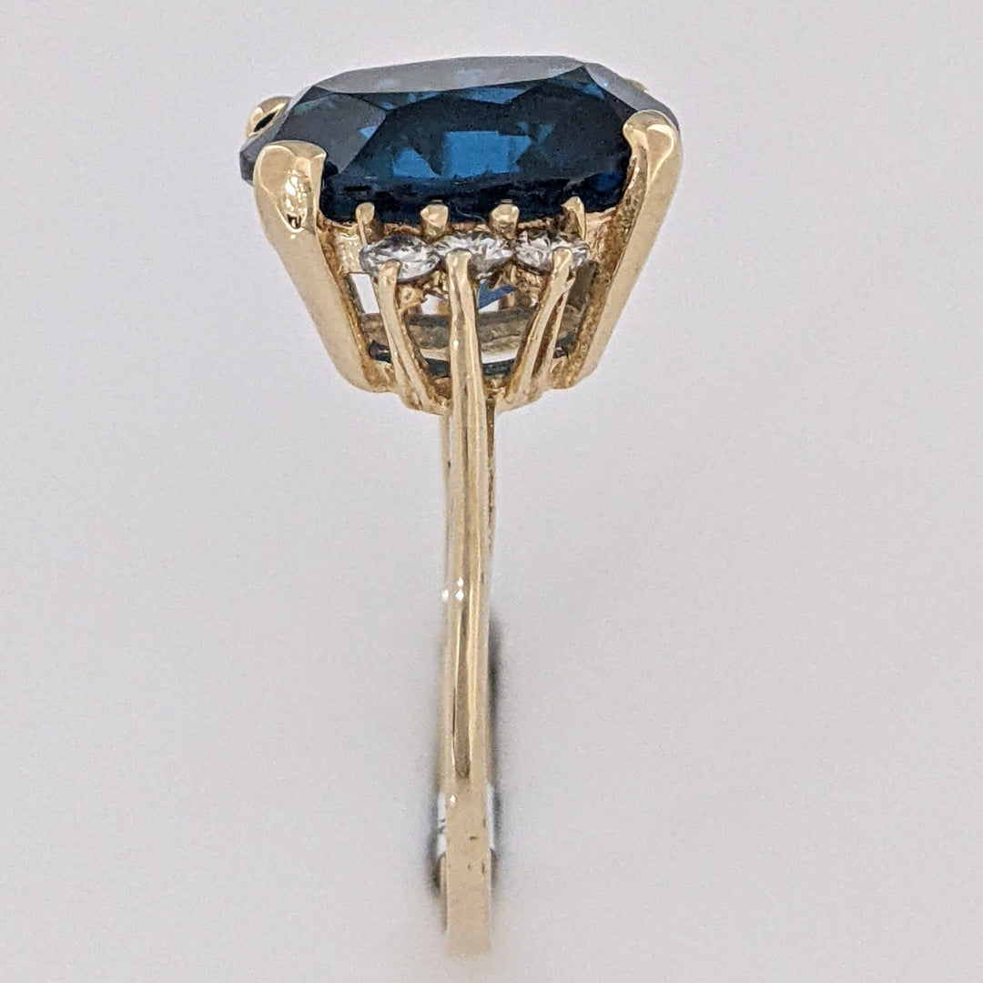 14K LONDON BLUE TOPAZ OVAL 10X12 WITH (6) MELEE ESTATE RING 3.3 GRAMS