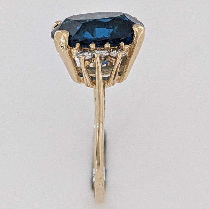 14K LONDON BLUE TOPAZ OVAL 10X12 WITH (6) MELEE ESTATE RING 3.3 GRAMS