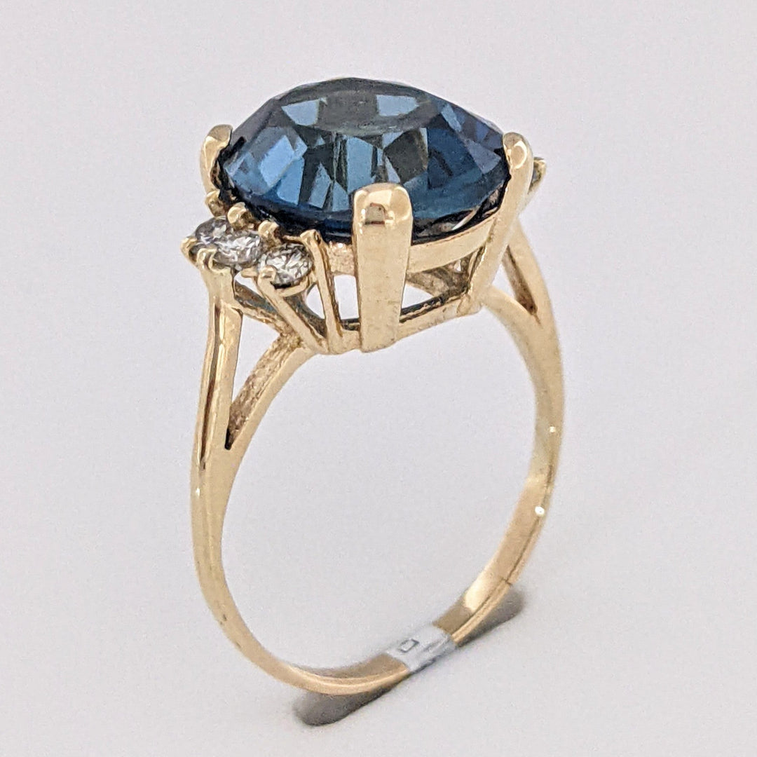 14K LONDON BLUE TOPAZ OVAL 10X12 WITH (6) MELEE ESTATE RING 3.3 GRAMS