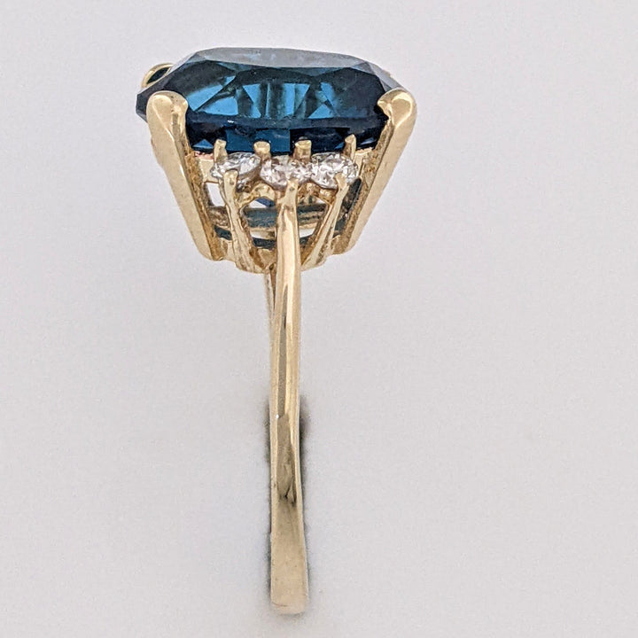 14K LONDON BLUE TOPAZ OVAL 10X12 WITH (6) MELEE ESTATE RING 3.3 GRAMS