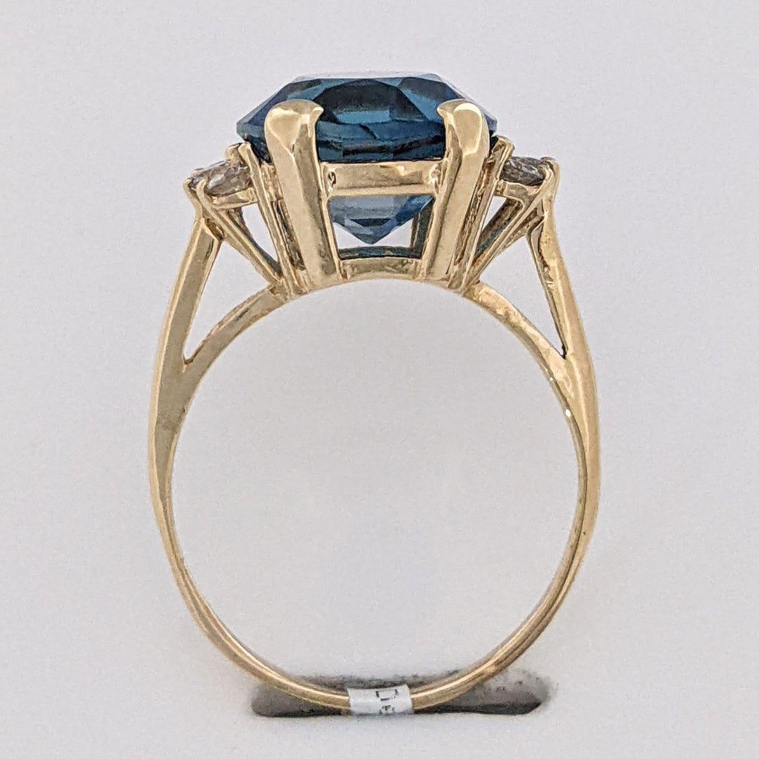 14K LONDON BLUE TOPAZ OVAL 10X12 WITH (6) MELEE ESTATE RING 3.3 GRAMS