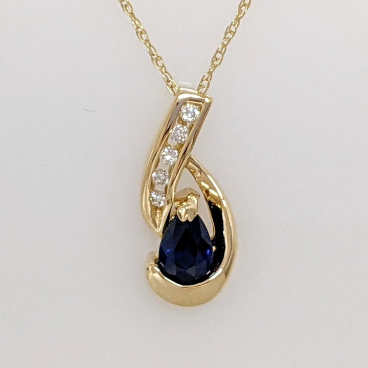 14K SAPPHIRE PEAR 3.4X4.2 WITH (5) MELEE ESTATE PENDANT & CHAIN 1.6 GRAMS