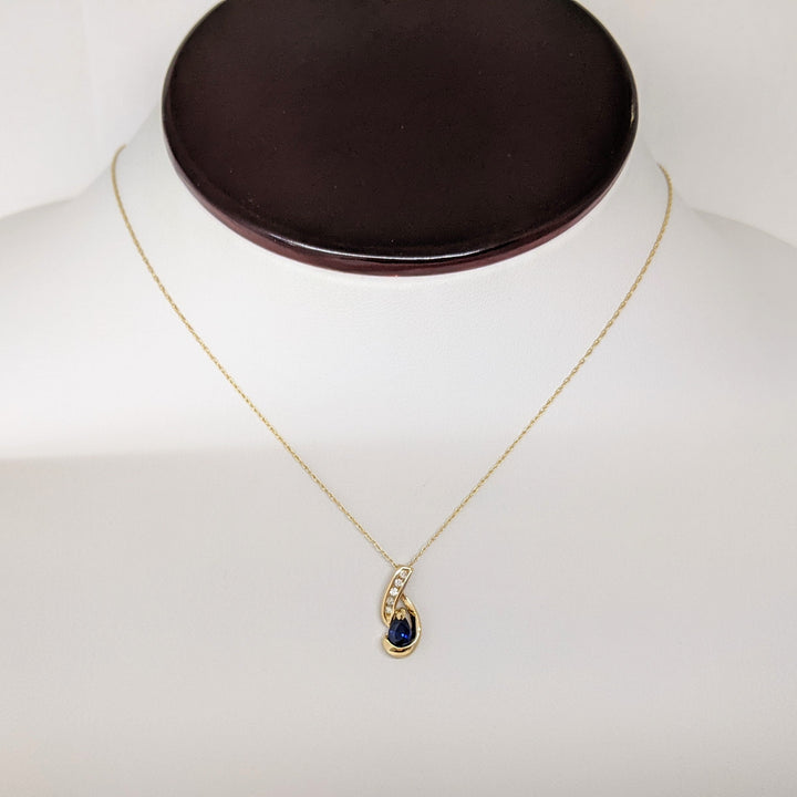 14K SAPPHIRE PEAR 3.4X4.2 WITH (5) MELEE ESTATE PENDANT & CHAIN 1.6 GRAMS