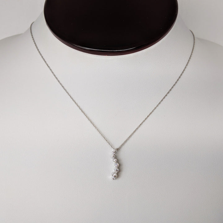 14K WHITE .20 CARAT TOTAL WEIGHT DIAMOND ROUND (7) ESTATE JOURNEY PENDANT & CHAIN 1.8 GRAMS