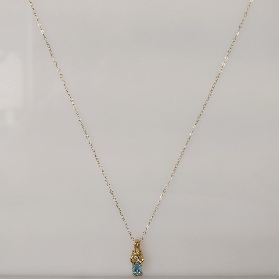 10K BLUE TOPAZ OVAL 4X6 WITH MELEE ESTATE PENDANT & CHAIN 1.1 GRAMS
