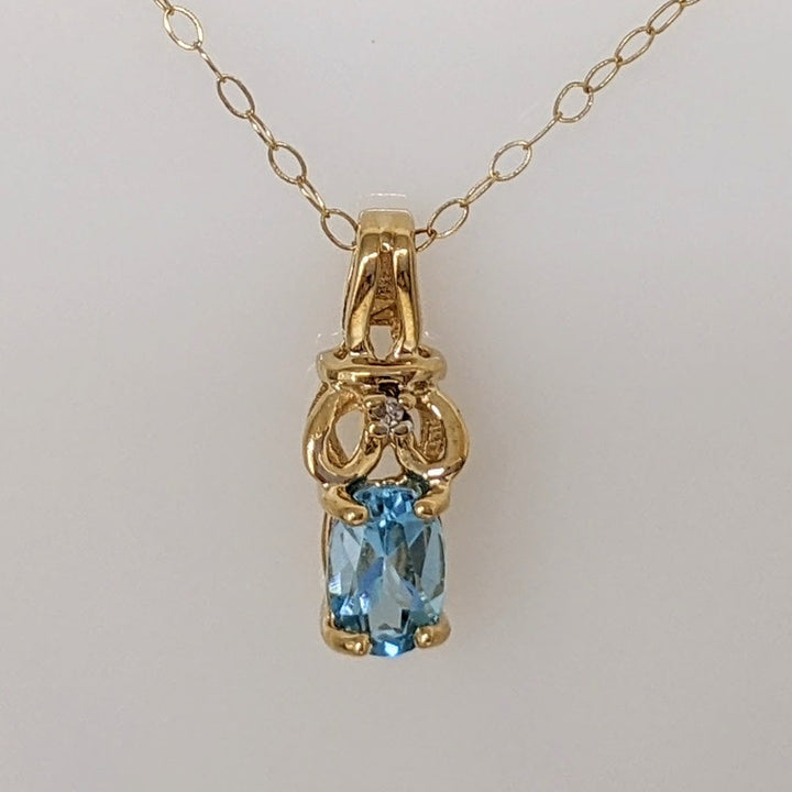 10K BLUE TOPAZ OVAL 4X6 WITH MELEE ESTATE PENDANT & CHAIN 1.1 GRAMS