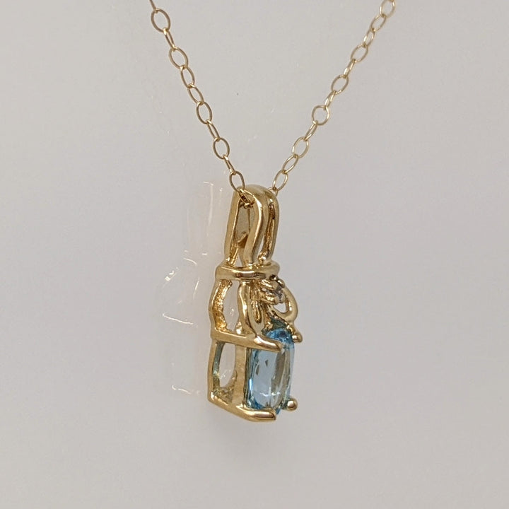 10K BLUE TOPAZ OVAL 4X6 WITH MELEE ESTATE PENDANT & CHAIN 1.1 GRAMS