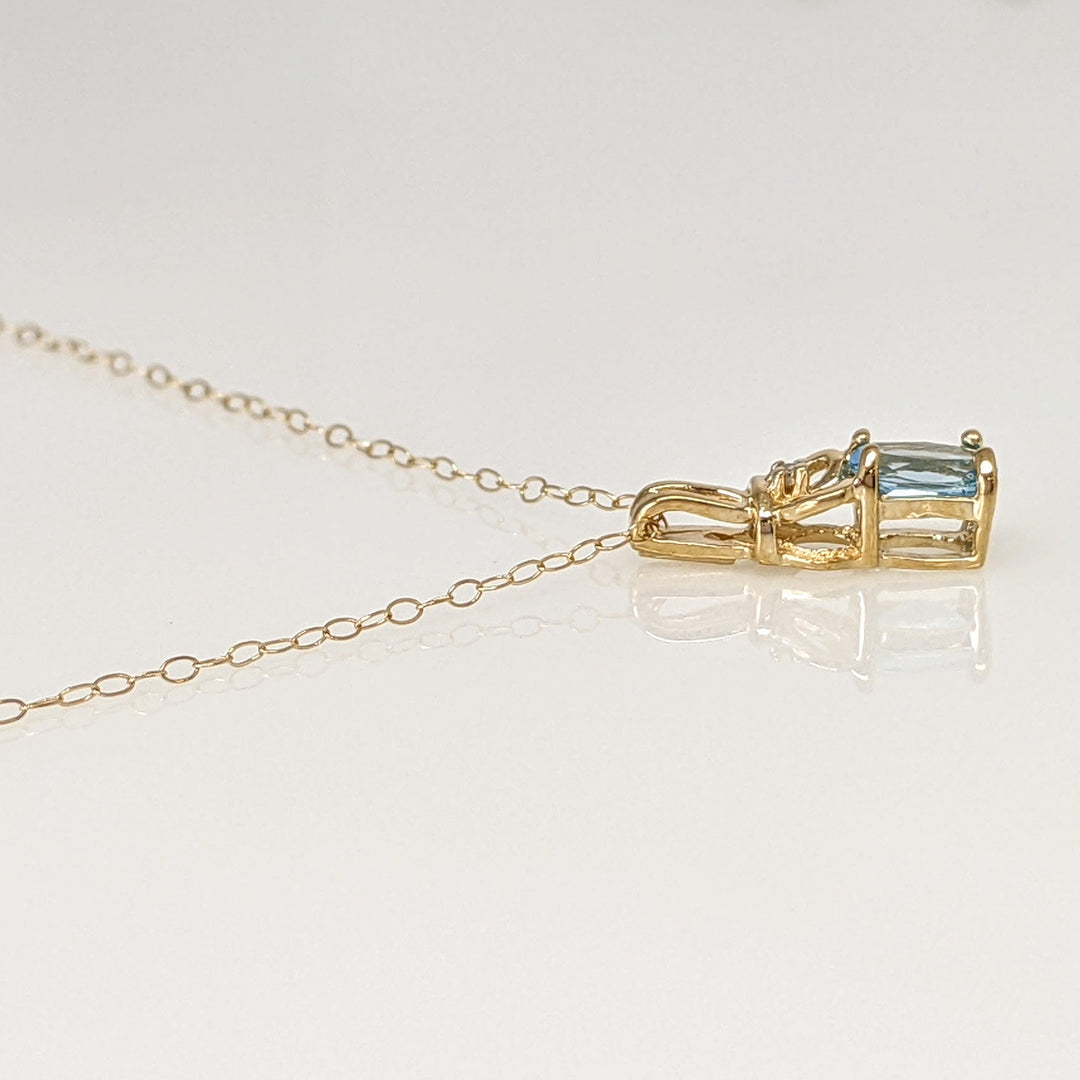 10K BLUE TOPAZ OVAL 4X6 WITH MELEE ESTATE PENDANT & CHAIN 1.1 GRAMS