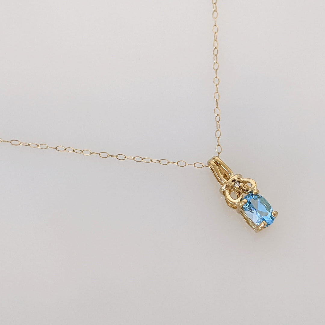14K BLUE TOPAZ ROUND 6MM ESTATE PENDANT & CHAIN 2.0 GRAMS
