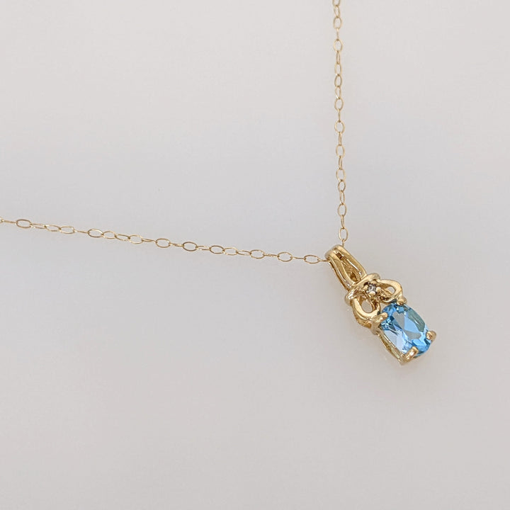 14K BLUE TOPAZ ROUND 6MM ESTATE PENDANT & CHAIN 2.0 GRAMS