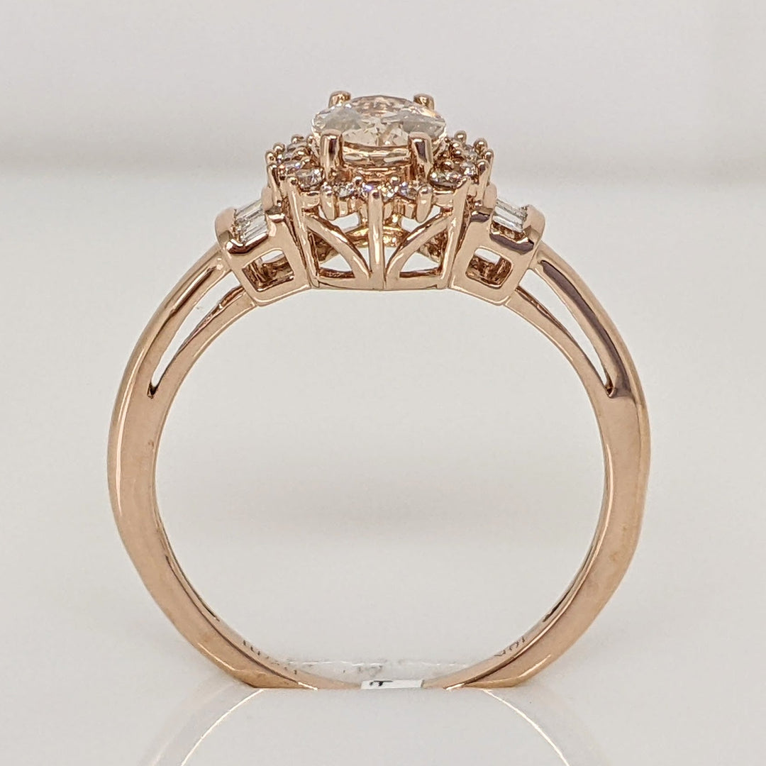 10K ROSE MORGANITE OVAL 5X7 WITH (16) ROUND (8) BAGUETTE .21 DIAMOND TOTAL WEIGHT ESTATE RING 1.8 GRAMS