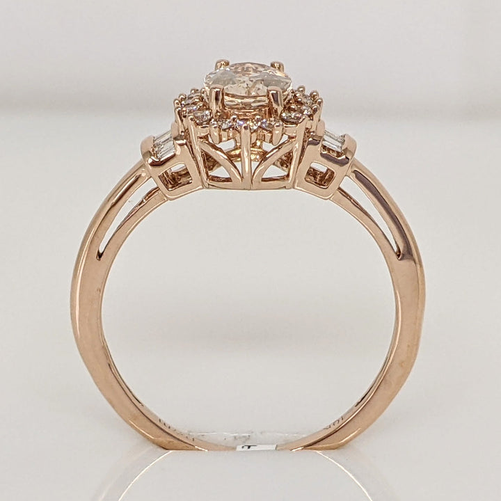 10K ROSE MORGANITE OVAL 5X7 WITH (16) ROUND (8) BAGUETTE .21 DIAMOND TOTAL WEIGHT ESTATE RING 1.8 GRAMS