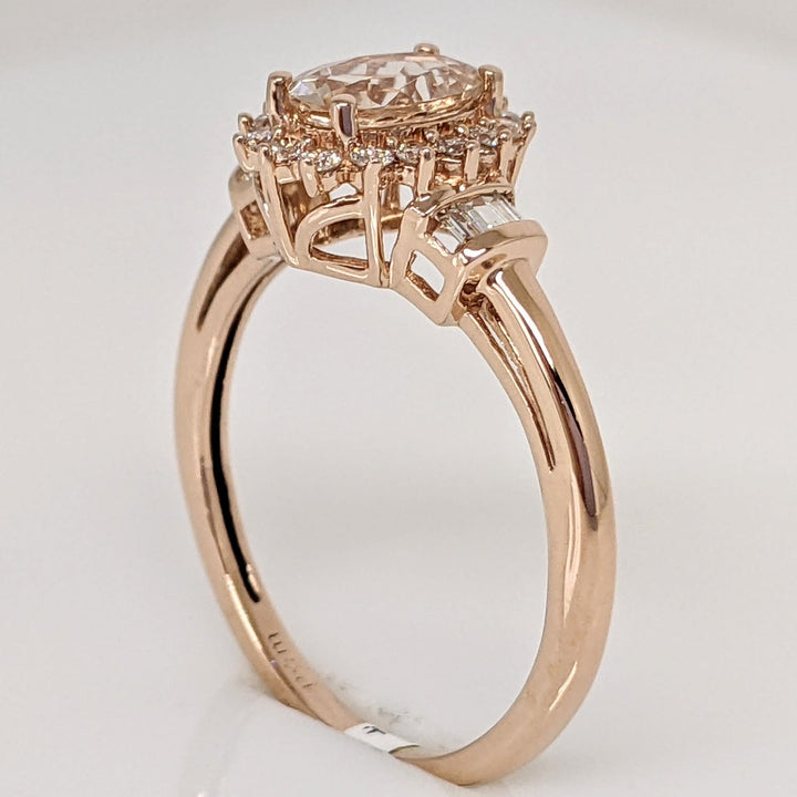 10K ROSE MORGANITE OVAL 5X7 WITH (16) ROUND (8) BAGUETTE .21 DIAMOND TOTAL WEIGHT ESTATE RING 1.8 GRAMS