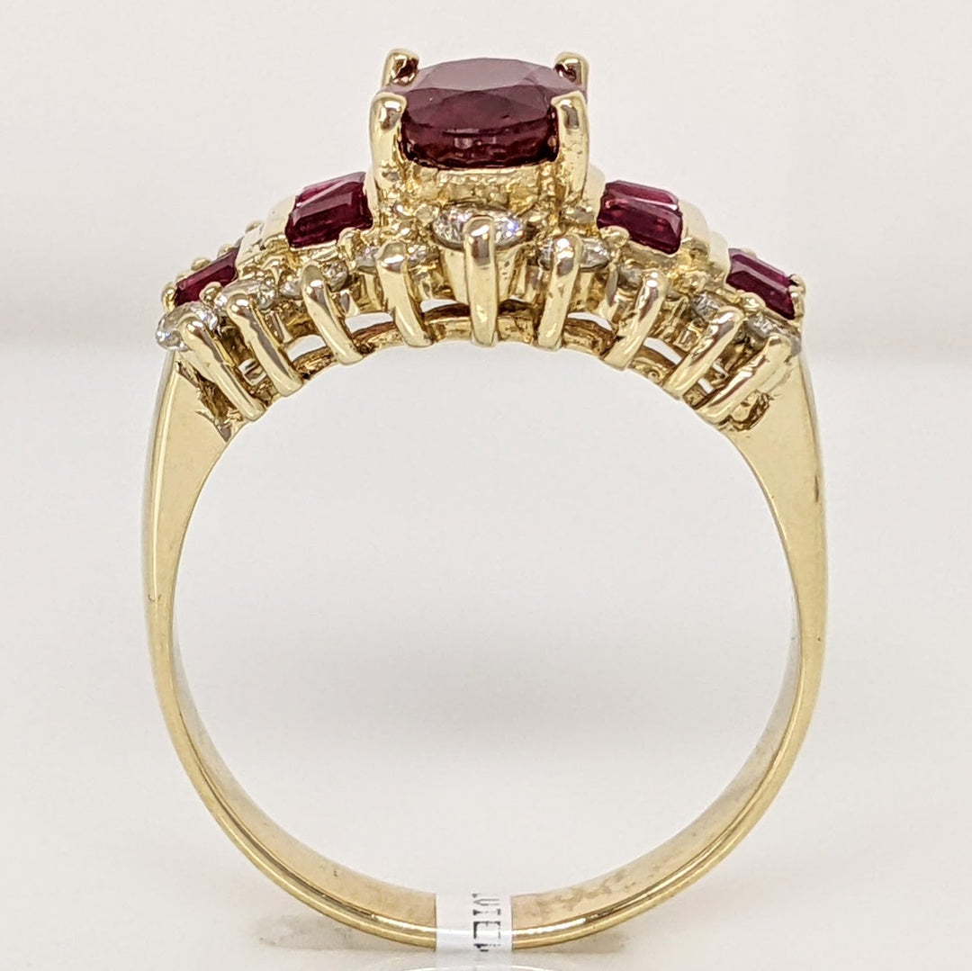 14K LAB-CREATED RUBY OVAL 6X8 WITH (10) BAGUETTE AND .52 DIAMOND TOTAL WEIGHT ESTATE RING 5.8 GRAMS