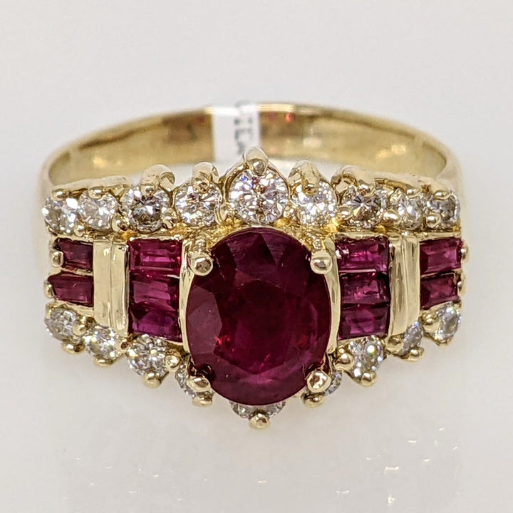 14K LAB-CREATED RUBY OVAL 6X8 WITH (10) BAGUETTE AND .52 DIAMOND TOTAL WEIGHT ESTATE RING 5.8 GRAMS