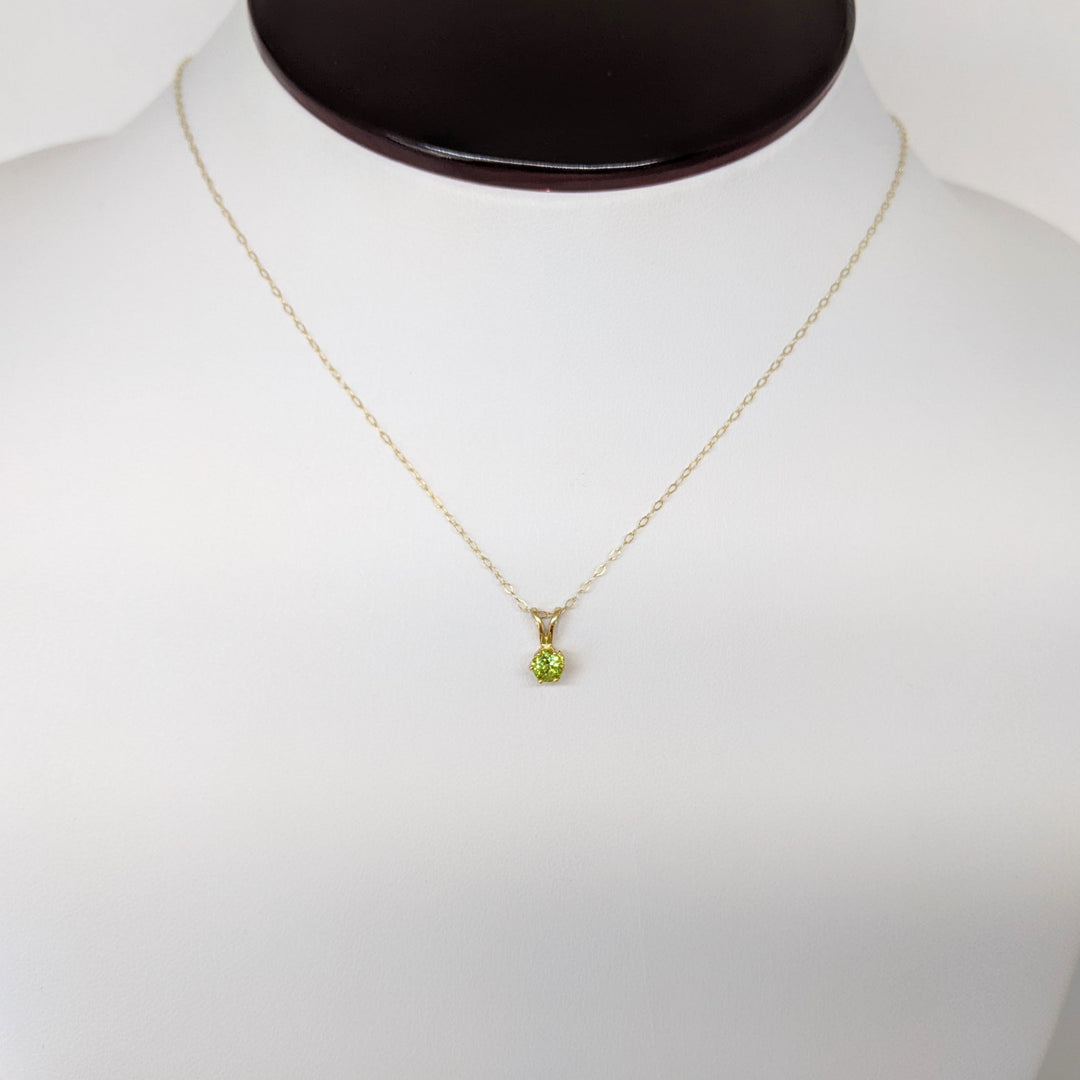 14K PERIDOT ROUND 4MM ESTATE PENDANT & CHAIN 0.8 GRAMS