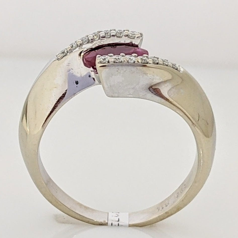 14K WHITE CLARITY ENHANCED RUBY OVAL 4X7 WITH .14 DIAMOND TOTAL WEIGHT ESTATE RING 4.7 GRAMS