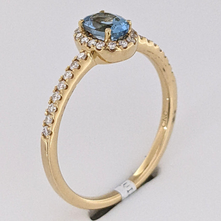 14K AQUAMARINE OVAL .59 CARAT TOTAL WITH .15 DIAMOND TOTAL WEIGHT ESTATE HALO RING 2.2 GRAMS