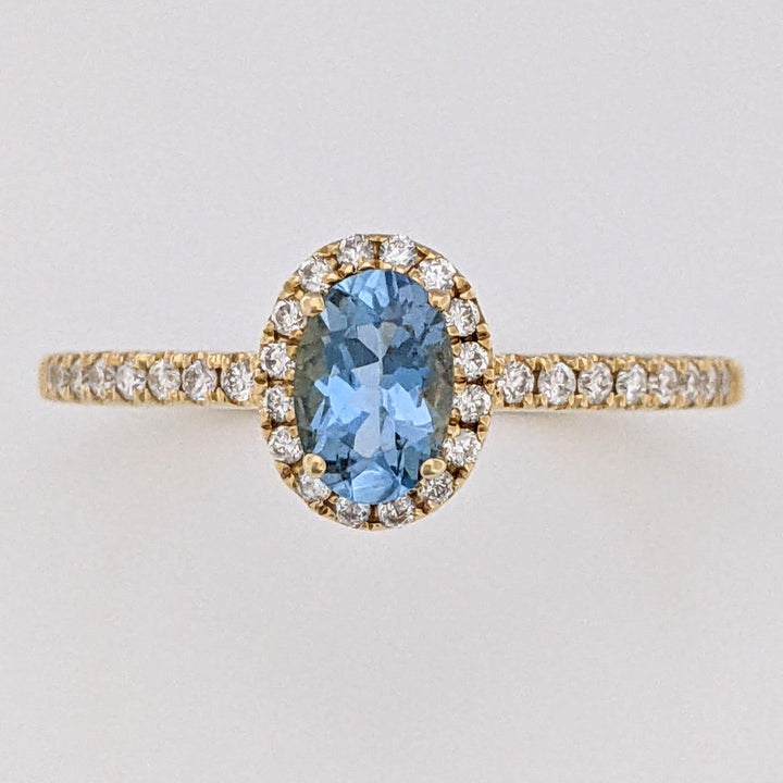 14K AQUAMARINE OVAL .59 CARAT TOTAL WITH .15 DIAMOND TOTAL WEIGHT ESTATE HALO RING 2.2 GRAMS