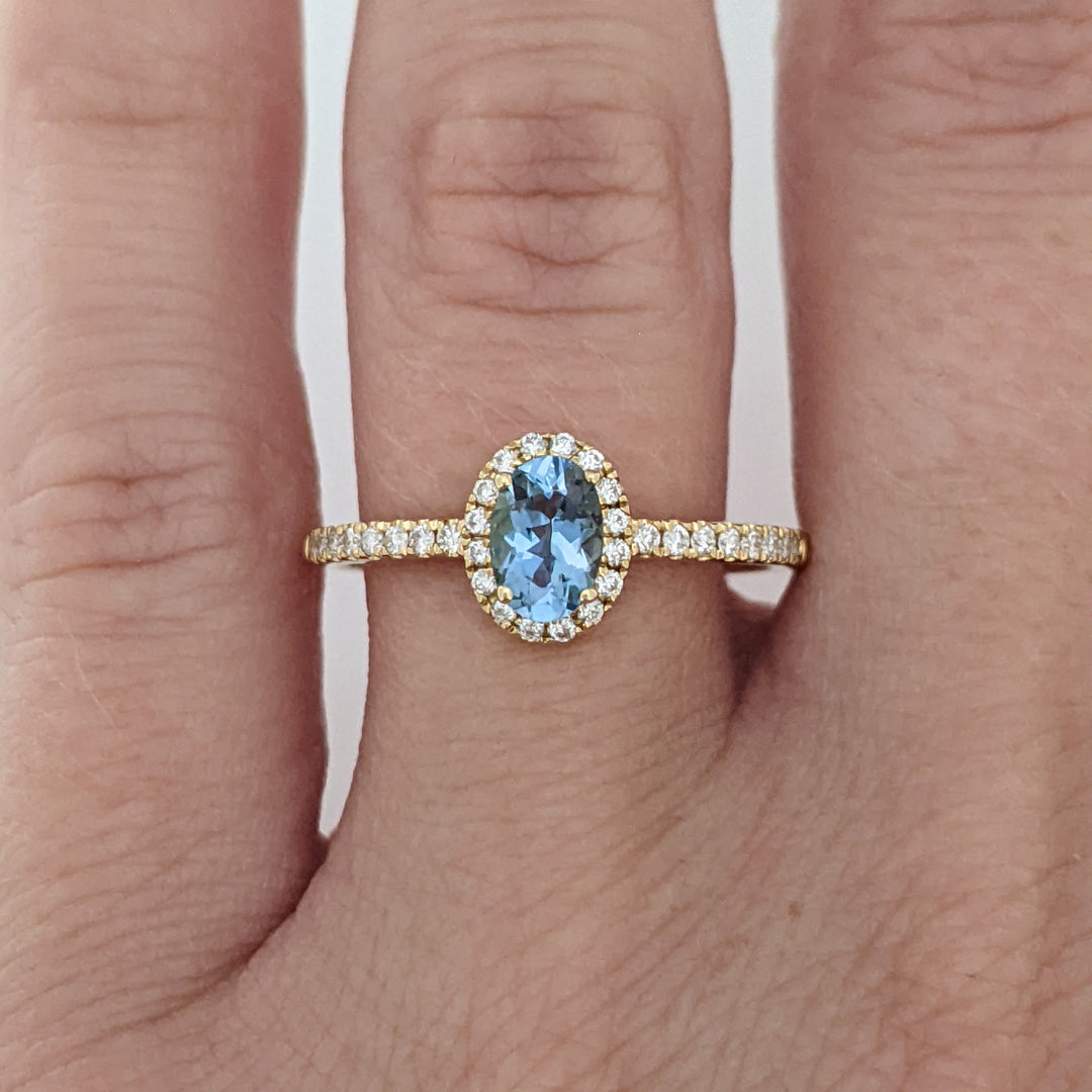 14K AQUAMARINE OVAL .59 CARAT TOTAL WITH .15 DIAMOND TOTAL WEIGHT ESTATE HALO RING 2.2 GRAMS