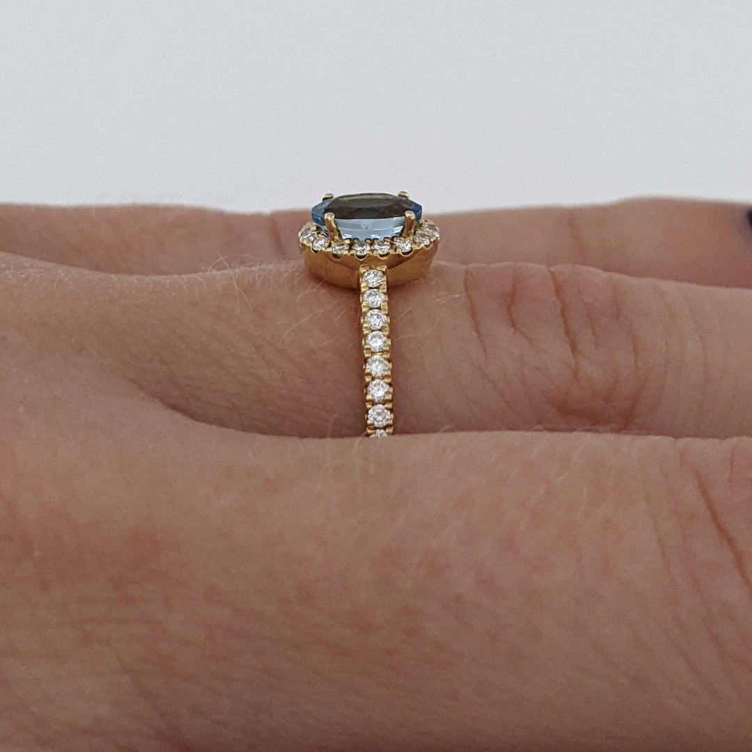 14K AQUAMARINE OVAL .59 CARAT TOTAL WITH .15 DIAMOND TOTAL WEIGHT ESTATE HALO RING 2.2 GRAMS
