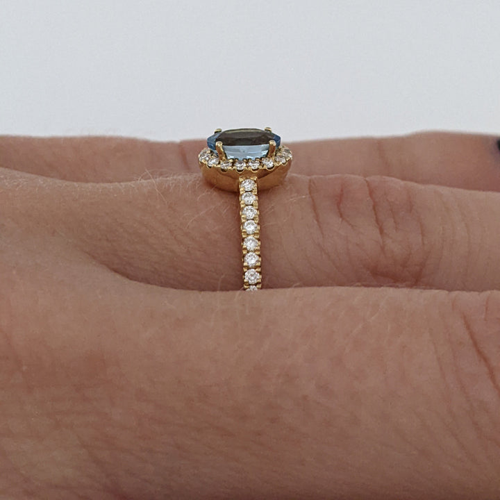 14K AQUAMARINE OVAL .59 CARAT TOTAL WITH .15 DIAMOND TOTAL WEIGHT ESTATE HALO RING 2.2 GRAMS