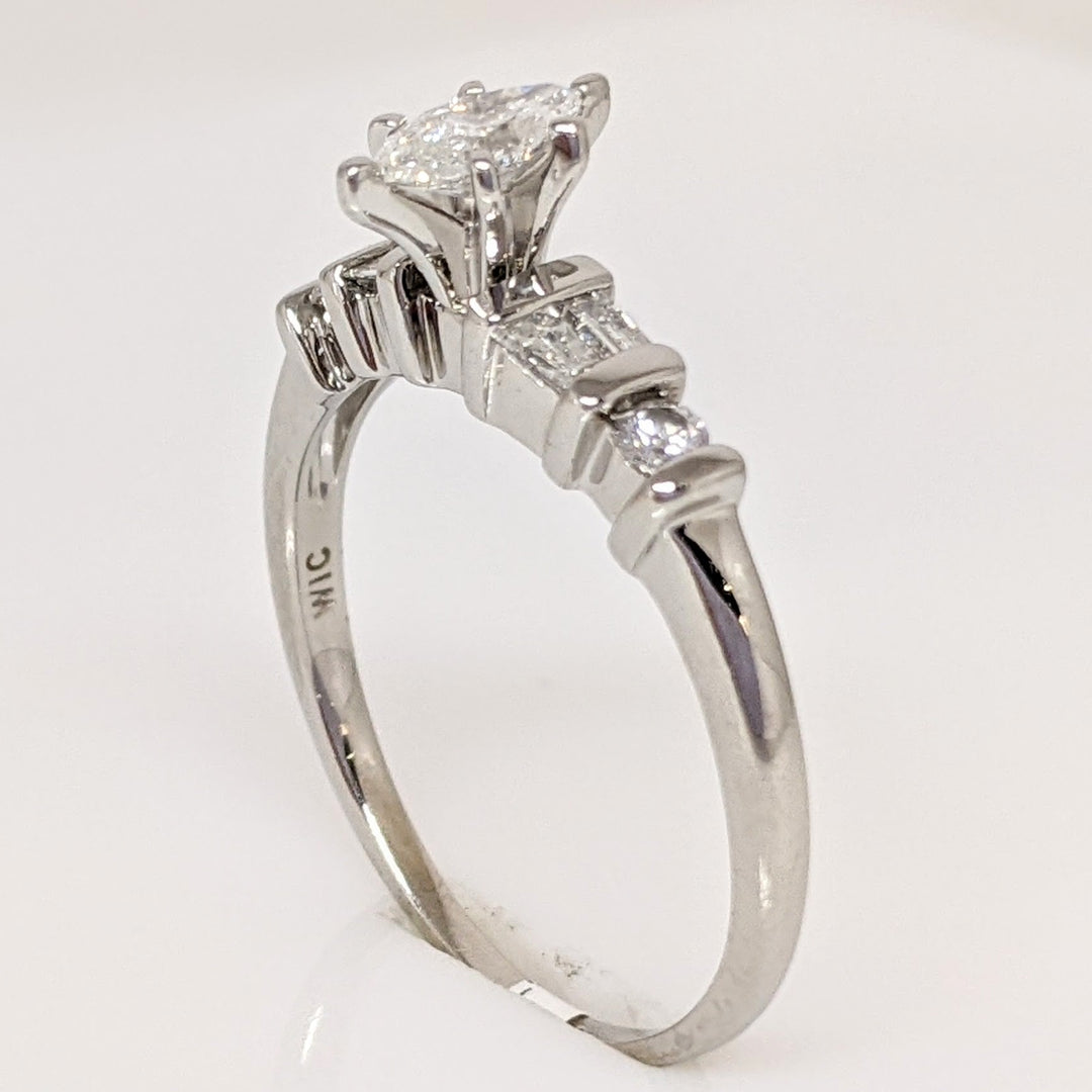 PLATINUM .41 CARAT TOTAL WEIGHT I1 F DIAMOND (1) MARQUISE CUT WITH (4) BAGUETTE CUT (2) ROUND ESTATE RING 4.0 GRAMS