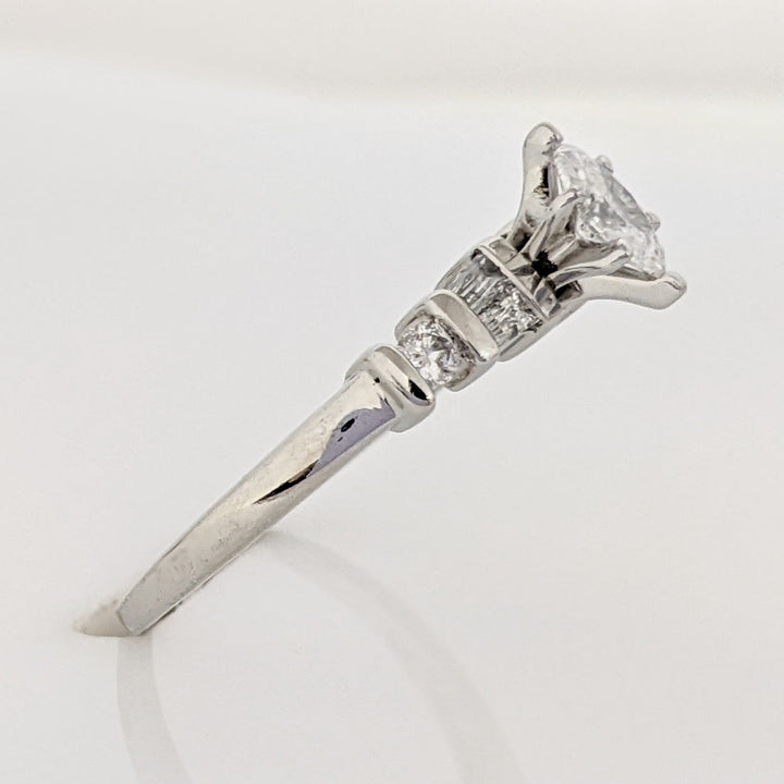 PLATINUM .41 CARAT TOTAL WEIGHT I1 F DIAMOND (1) MARQUISE CUT WITH (4) BAGUETTE CUT (2) ROUND ESTATE RING 4.0 GRAMS