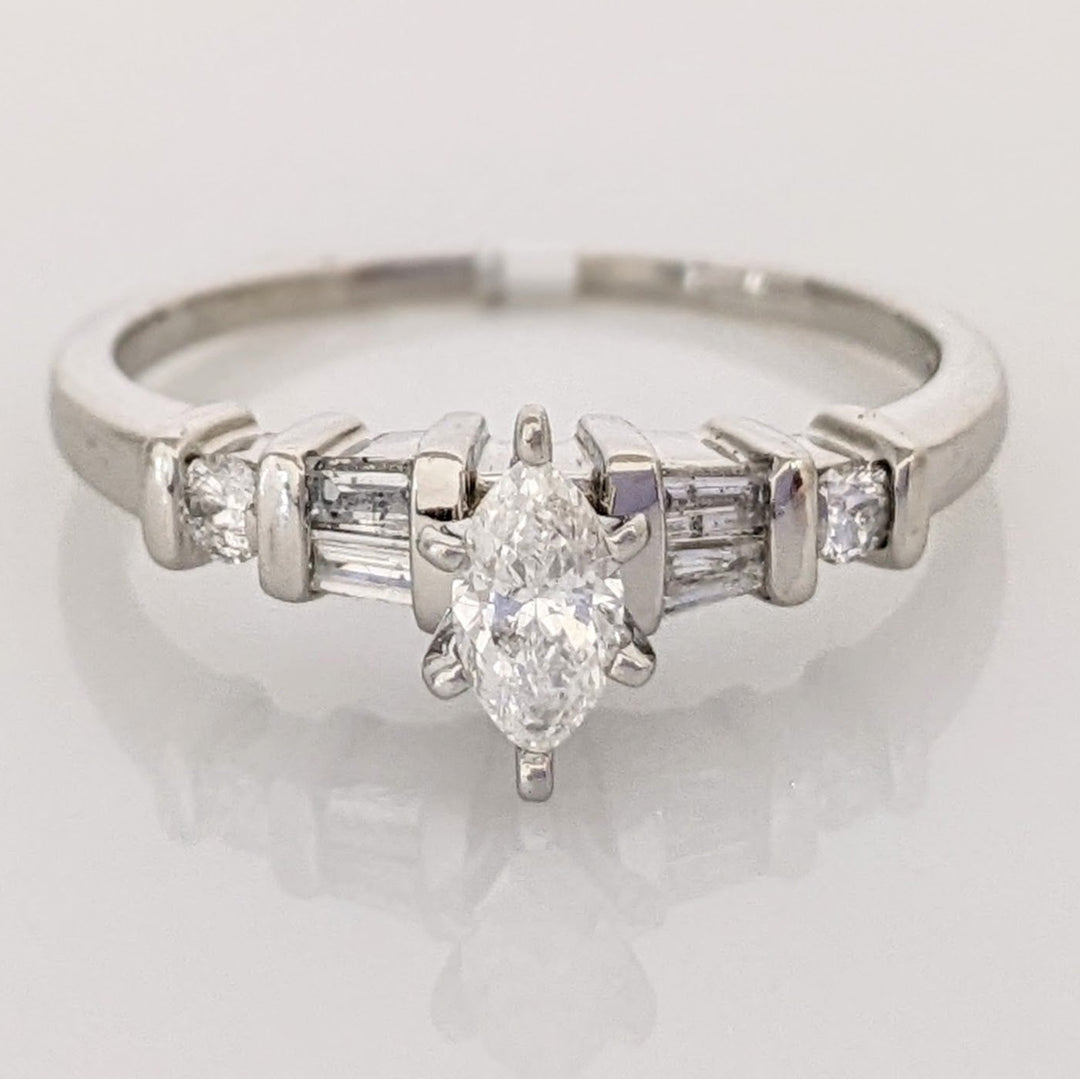 PLATINUM .41 CARAT TOTAL WEIGHT I1 F DIAMOND (1) MARQUISE CUT WITH (4) BAGUETTE CUT (2) ROUND ESTATE RING 4.0 GRAMS