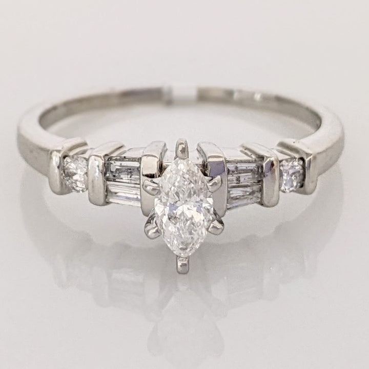PLATINUM .41 CARAT TOTAL WEIGHT I1 F DIAMOND (1) MARQUISE CUT WITH (4) BAGUETTE CUT (2) ROUND ESTATE RING 4.0 GRAMS