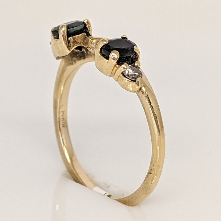 14K SAPPHIRE OVAL 3X4 WITH (2) MELEE ESTATE WRAP 2.2 GRAMS