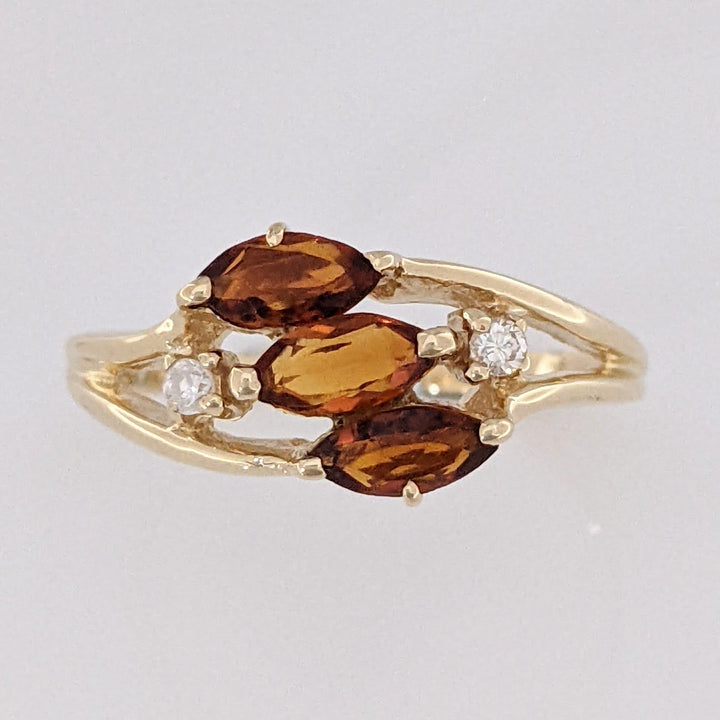 14K ORANGE GARNET MARQUISE (3) 3X5 WITH .04 DIAMOND TOTAL WEIGHT ESTATE RING 2.5 GRAMS
