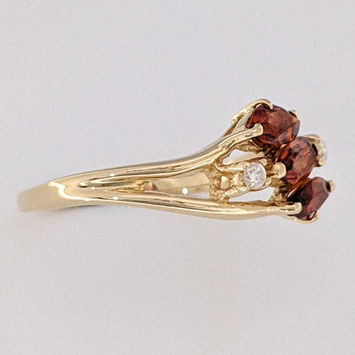 14K ORANGE GARNET MARQUISE (3) 3X5 WITH .04 DIAMOND TOTAL WEIGHT ESTATE RING 2.5 GRAMS