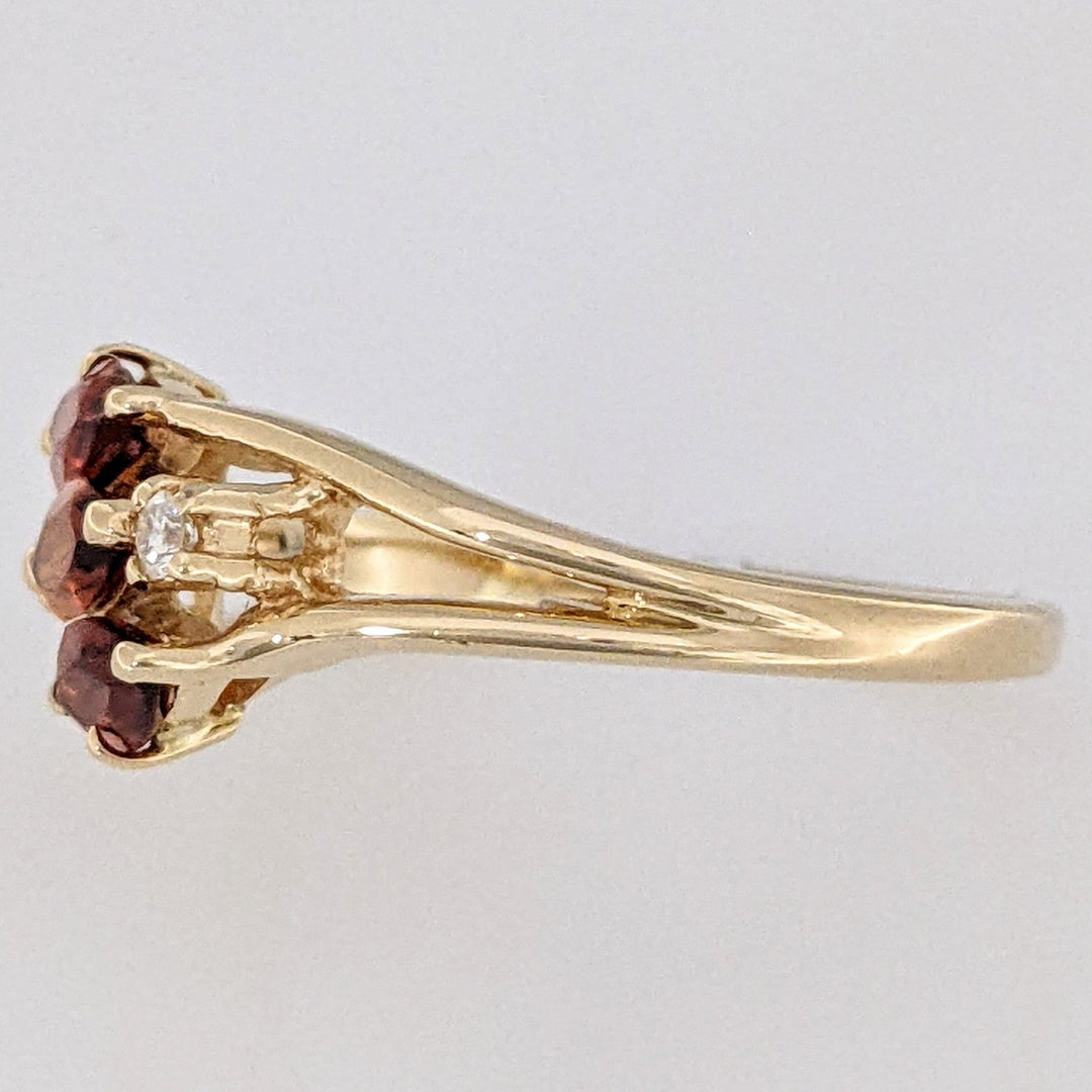 14K ORANGE GARNET MARQUISE (3) 3X5 WITH .04 DIAMOND TOTAL WEIGHT ESTATE RING 2.5 GRAMS