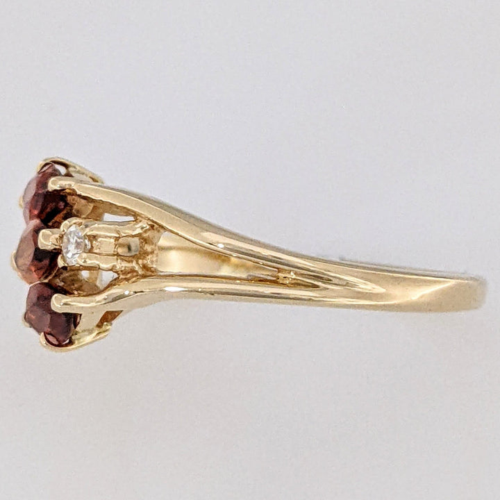 14K ORANGE GARNET MARQUISE (3) 3X5 WITH .04 DIAMOND TOTAL WEIGHT ESTATE RING 2.5 GRAMS