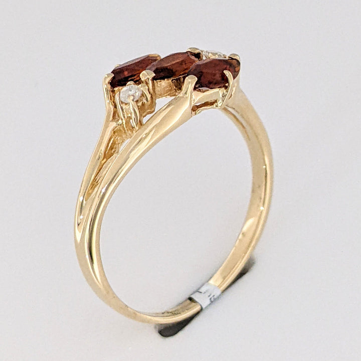 14K ORANGE GARNET MARQUISE (3) 3X5 WITH .04 DIAMOND TOTAL WEIGHT ESTATE RING 2.5 GRAMS