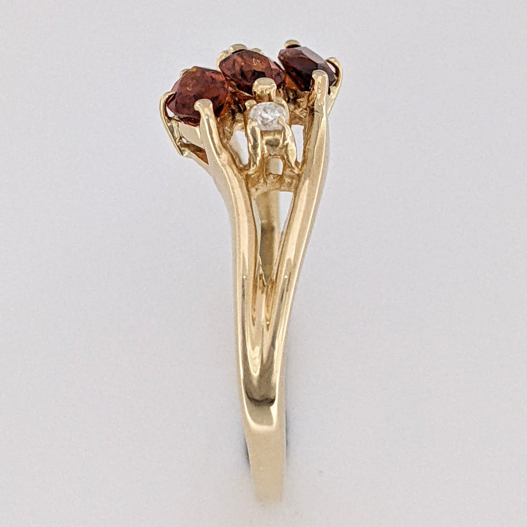 14K ORANGE GARNET MARQUISE (3) 3X5 WITH .04 DIAMOND TOTAL WEIGHT ESTATE RING 2.5 GRAMS