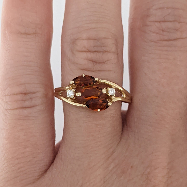 14K ORANGE GARNET MARQUISE (3) 3X5 WITH .04 DIAMOND TOTAL WEIGHT ESTATE RING 2.5 GRAMS