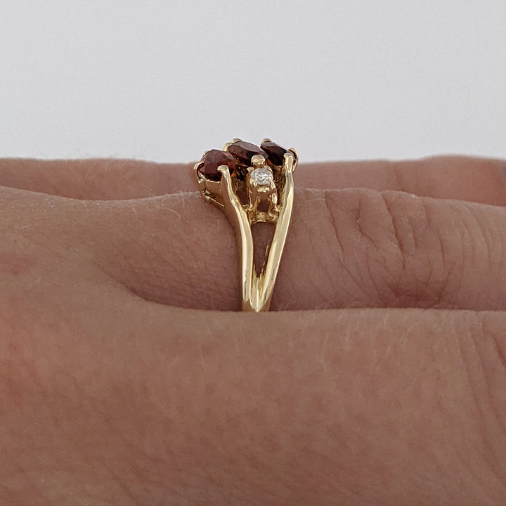 14K ORANGE GARNET MARQUISE (3) 3X5 WITH .04 DIAMOND TOTAL WEIGHT ESTATE RING 2.5 GRAMS