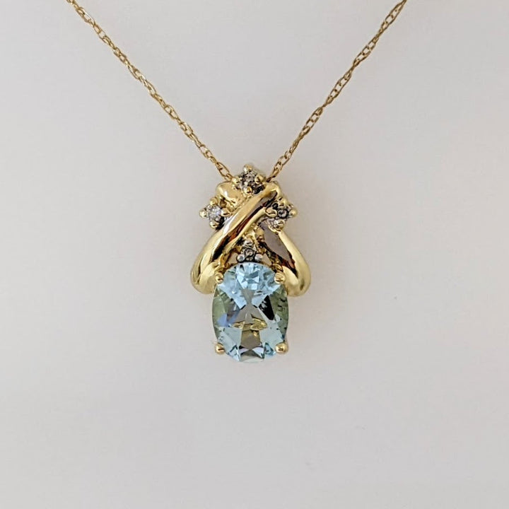 14K AQUAMARINE OVAL 6X8 WITH (4) MELEE ESTATE PENDANT & CHAIN 2.0 GRAMS