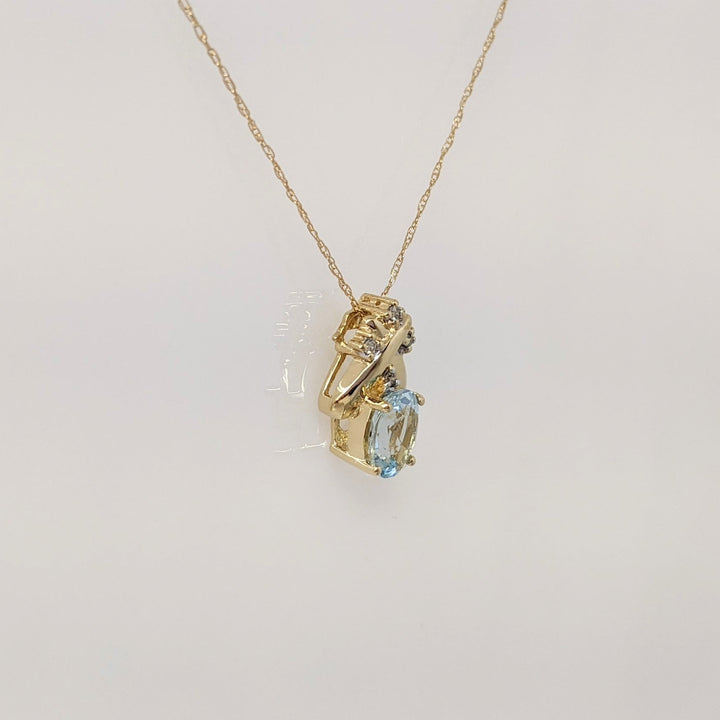 14K AQUAMARINE OVAL 6X8 WITH (4) MELEE ESTATE PENDANT & CHAIN 2.0 GRAMS