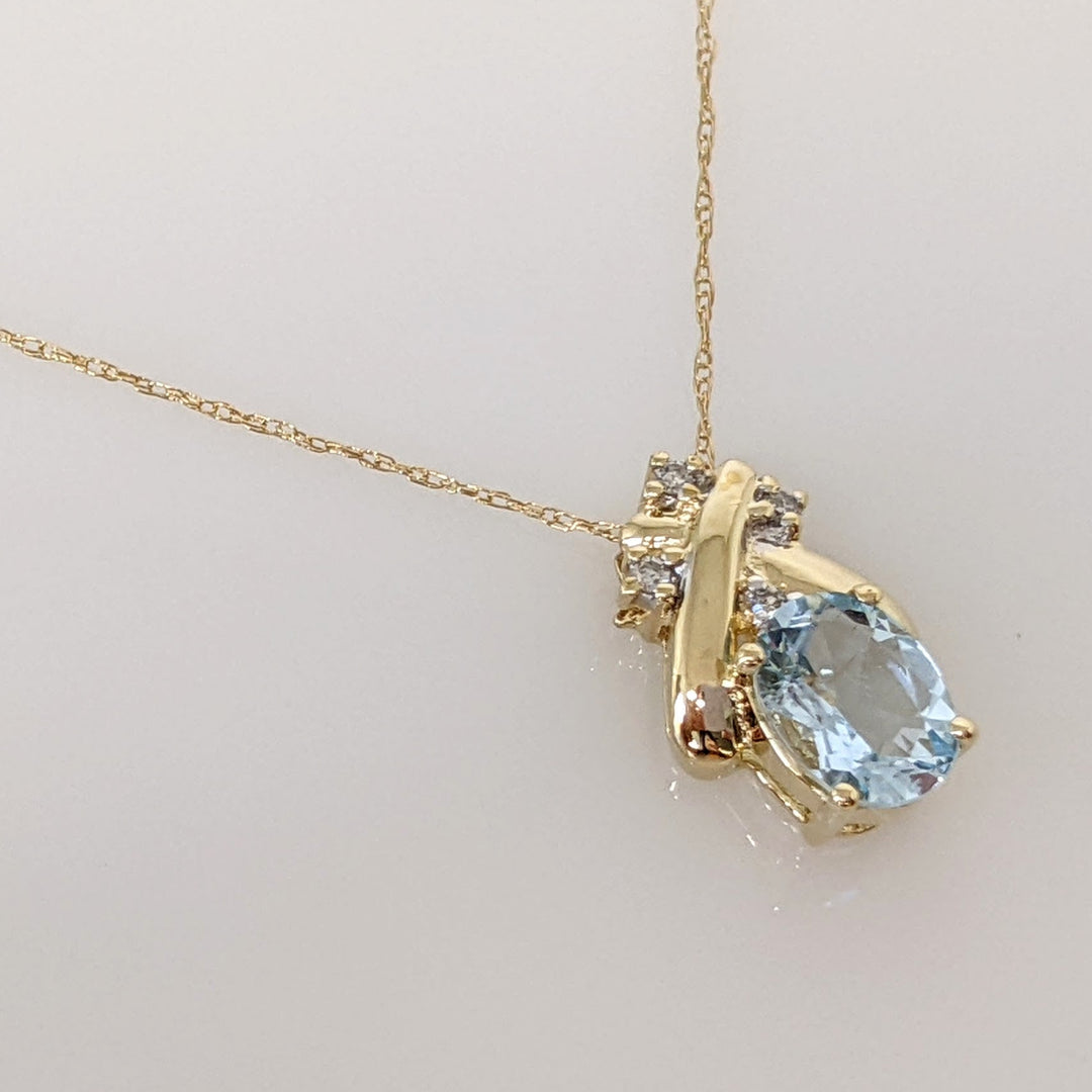 14K AQUAMARINE OVAL 6X8 WITH (4) MELEE ESTATE PENDANT & CHAIN 2.0 GRAMS
